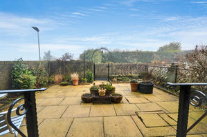 Rear paved garden- click for photo gallery